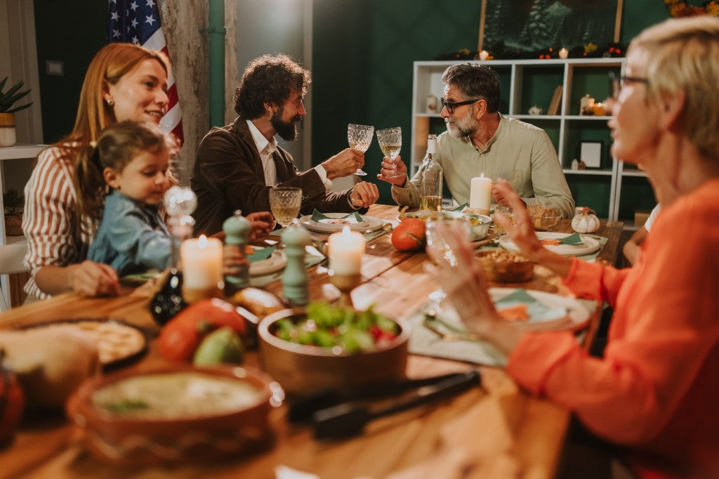 Family gathered around the table for a Pascha feast celebrating Easter and Christ's resurrection